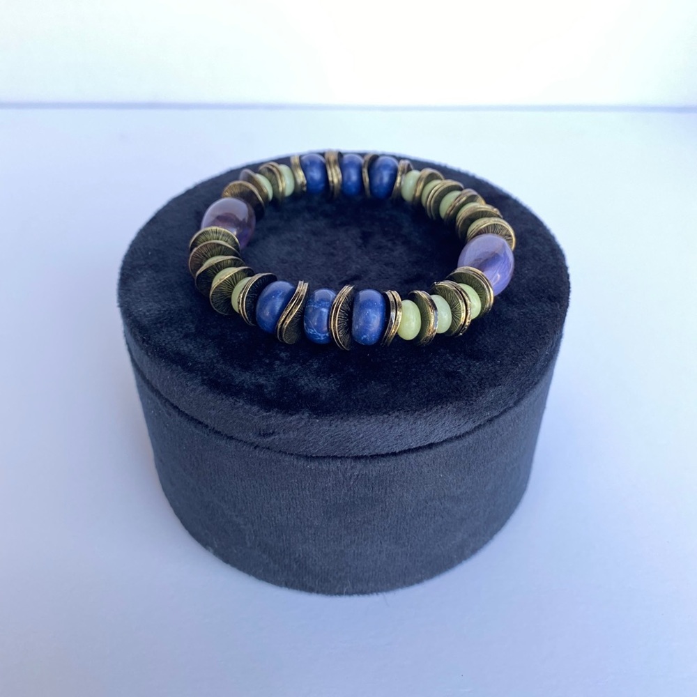 Multi stone bracelet with gold accents